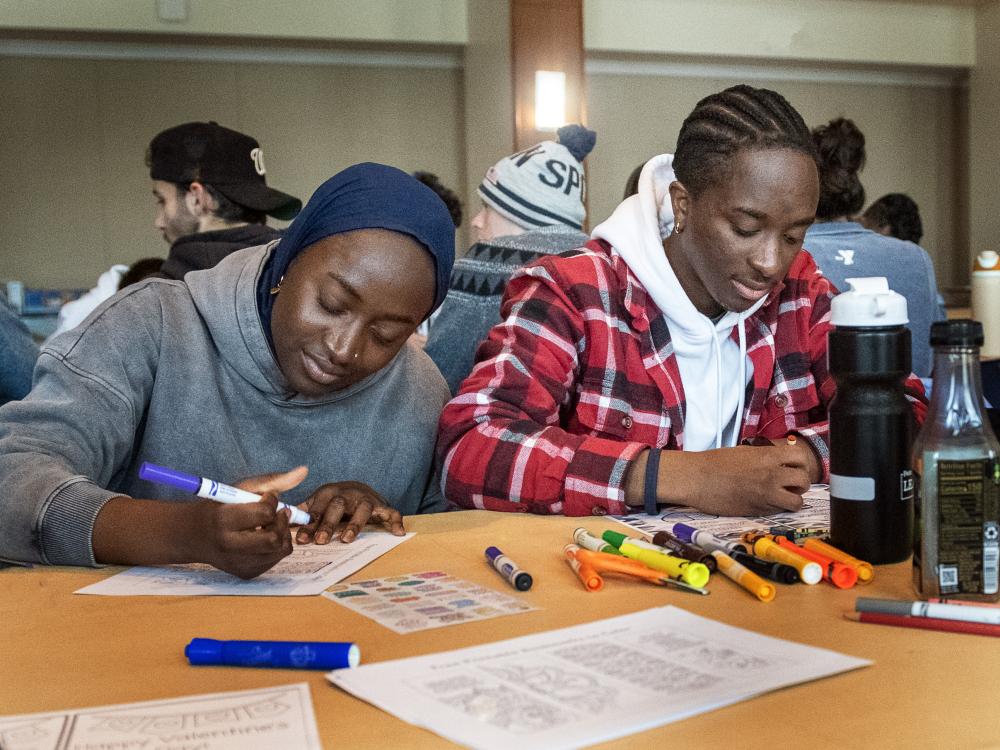 Students making cards for Veterans MLK Day of Service