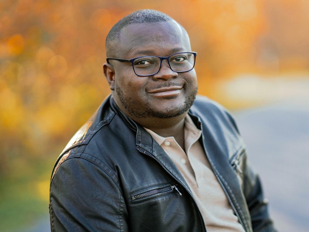 Outdoor photo of writer and Penn State assistant professor Samuel Kọ́láwọlé