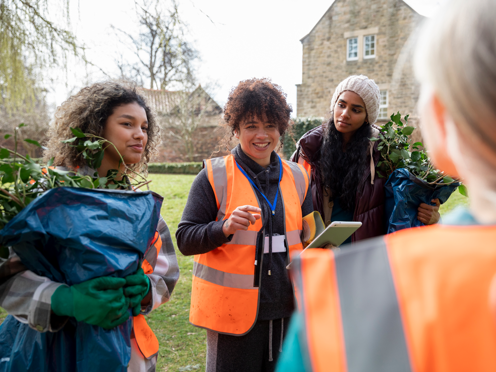 People volunteering outside