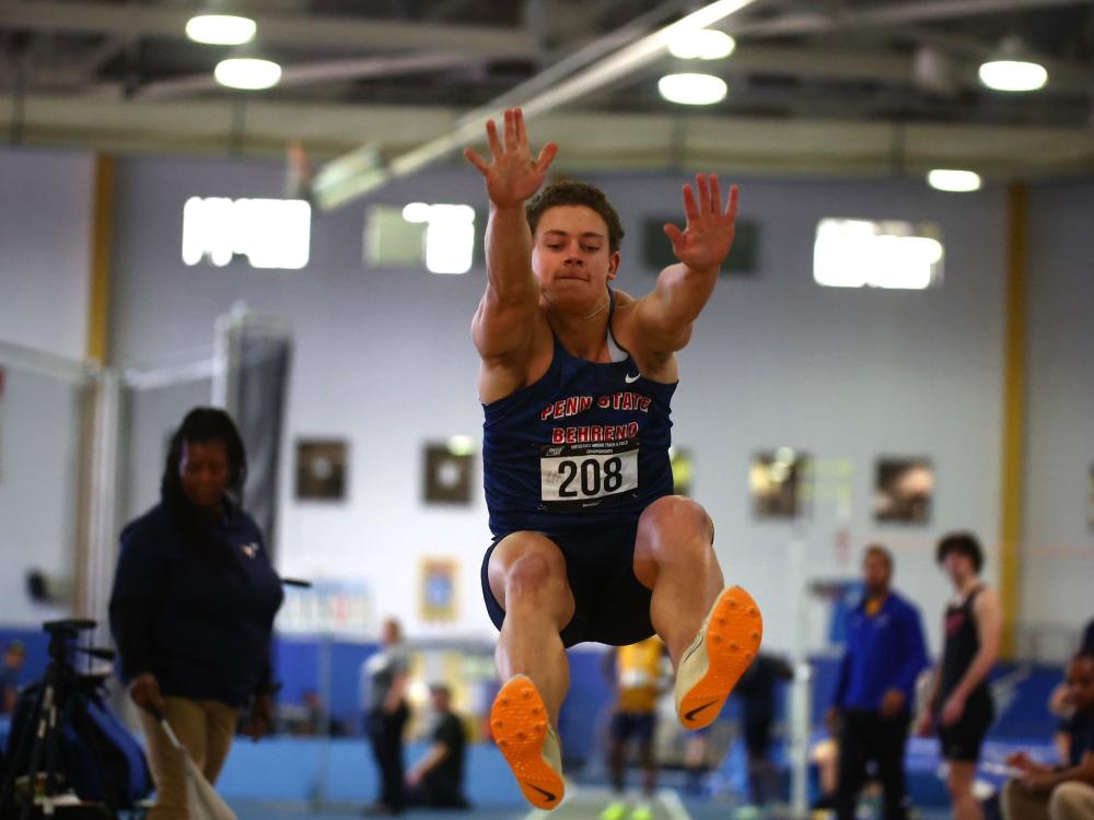 Penn State Behrend track-and-field athlete Brandon Konieczki competes in the long jump.