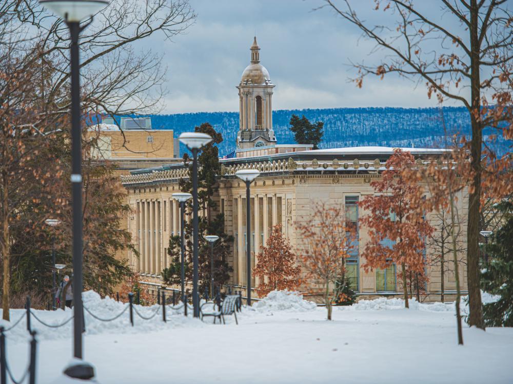 Old Main in winter with snow on the ground