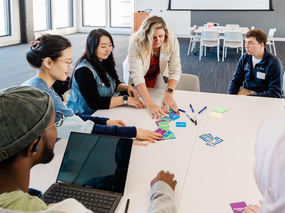 A group of students sitting around a table