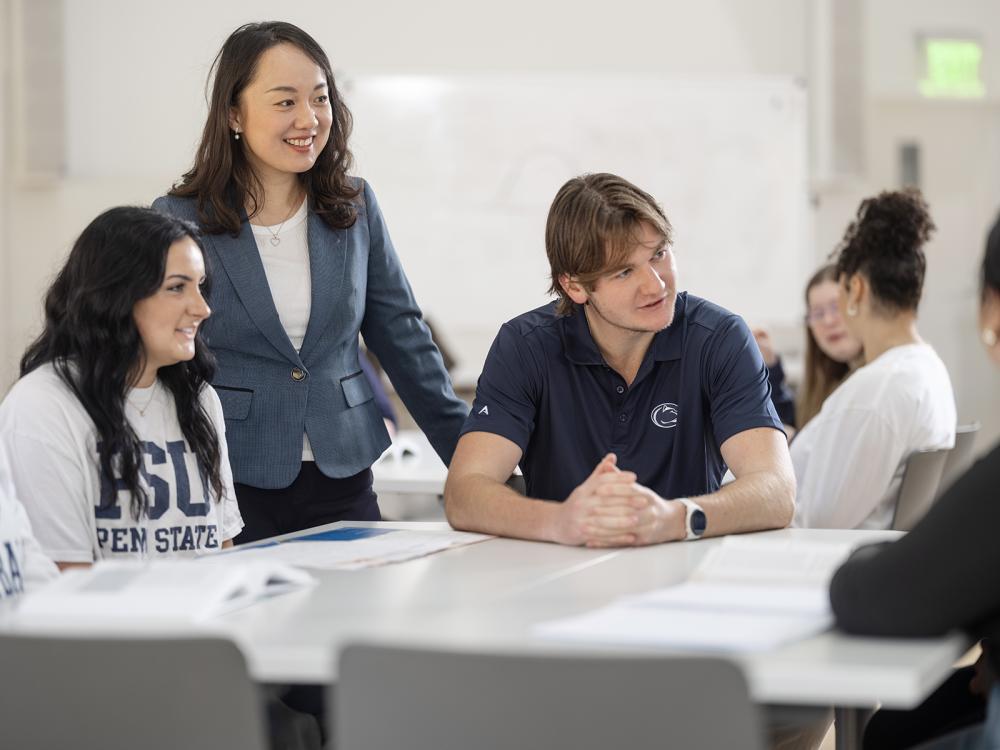 Professor interacting with students