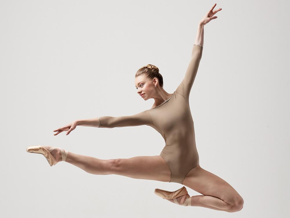 Ballet dancer leaps in air