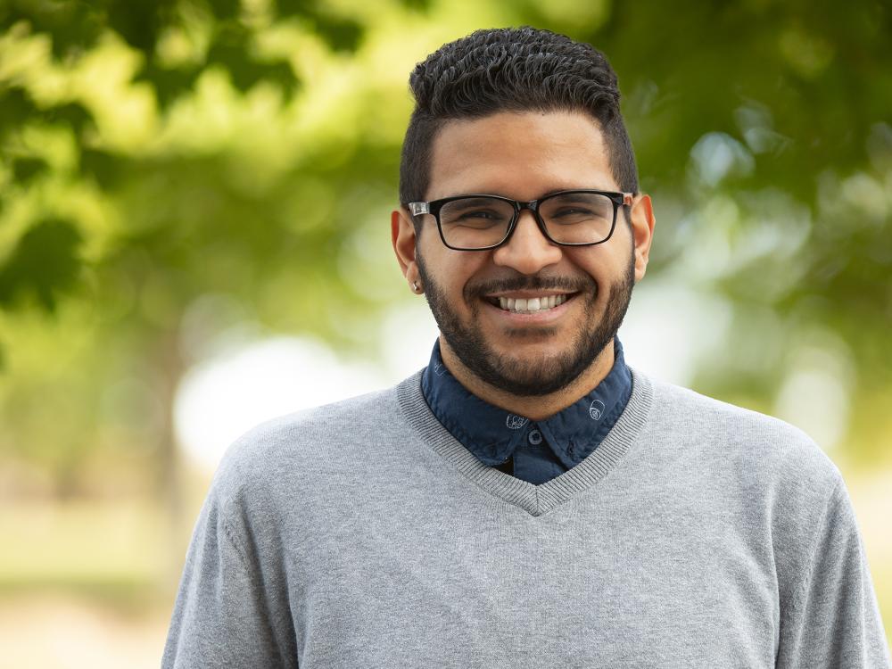 A photo of Navarro smiling