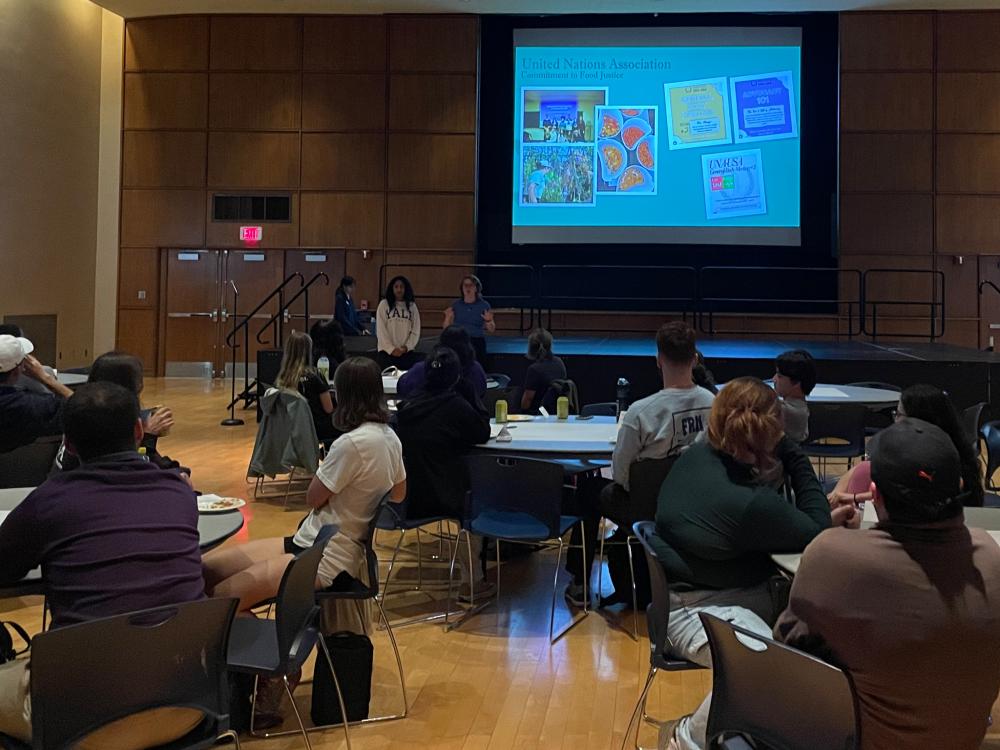 Students gather in Alumni Hall to listen to a lecture on student food insecurity.