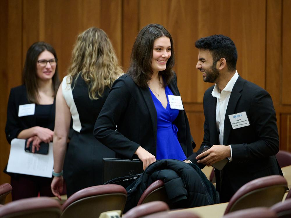 Scholars and mentors practice networking