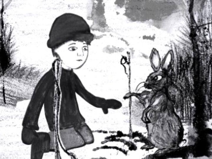 An illustration of a boy looking at a rabbit.