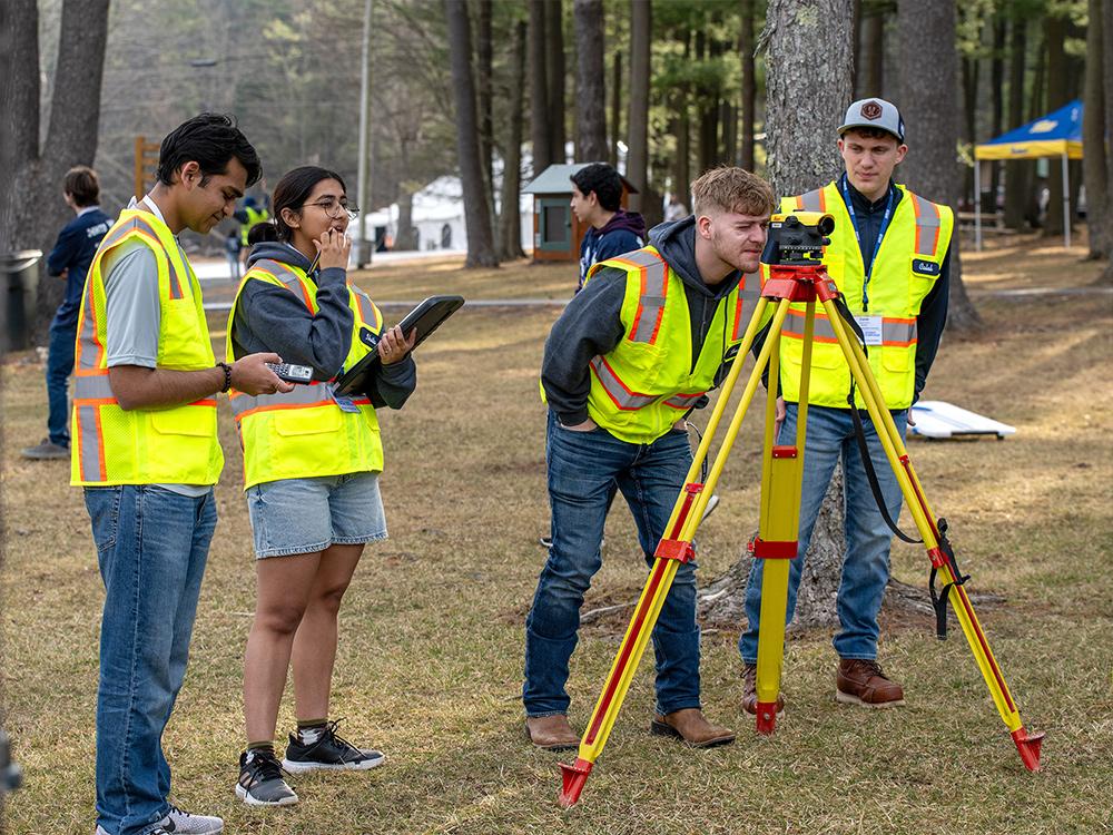 A student surveying team competes to win a surveying competition at Stone Valley Recreation Area.