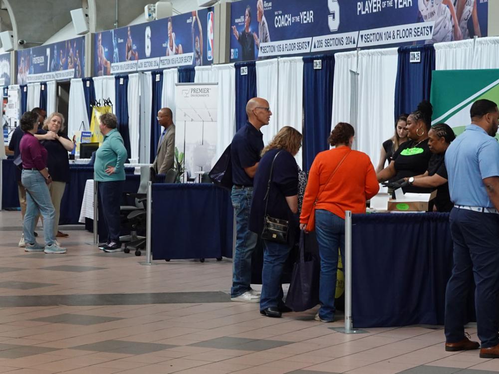 Diverse businesses engage with attendees during the 2024 Supplier Diversity Trade Fair