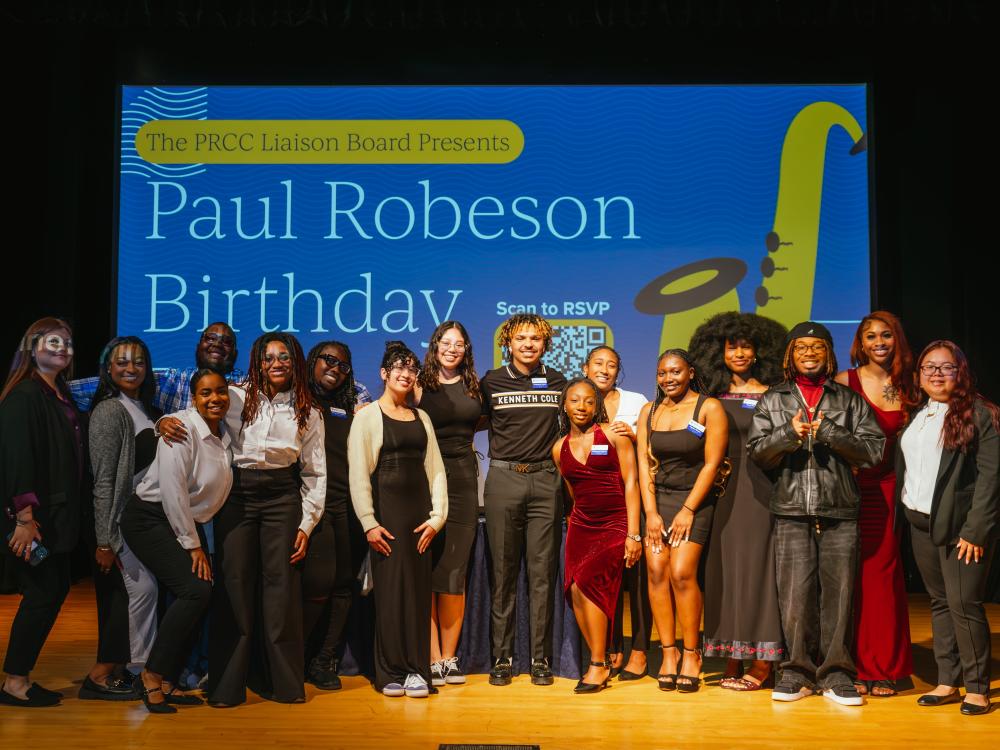 A group of students standing on stage.