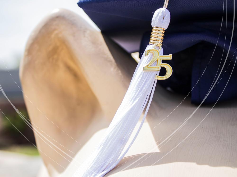 A 2025 graduation cap placed on the Lion Shrine at Penn State Scranton