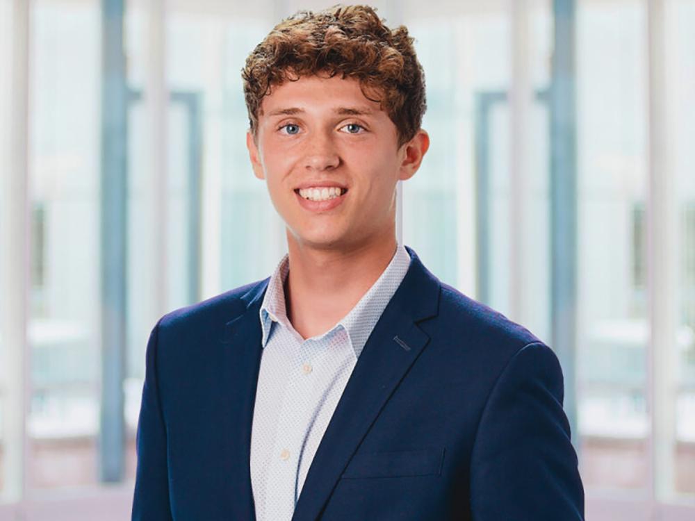  A head and shoulders photo of a smiling Jake Musmanno.