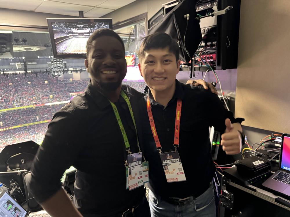 Sydney Smith and Austen Yim in a broadcast booth
