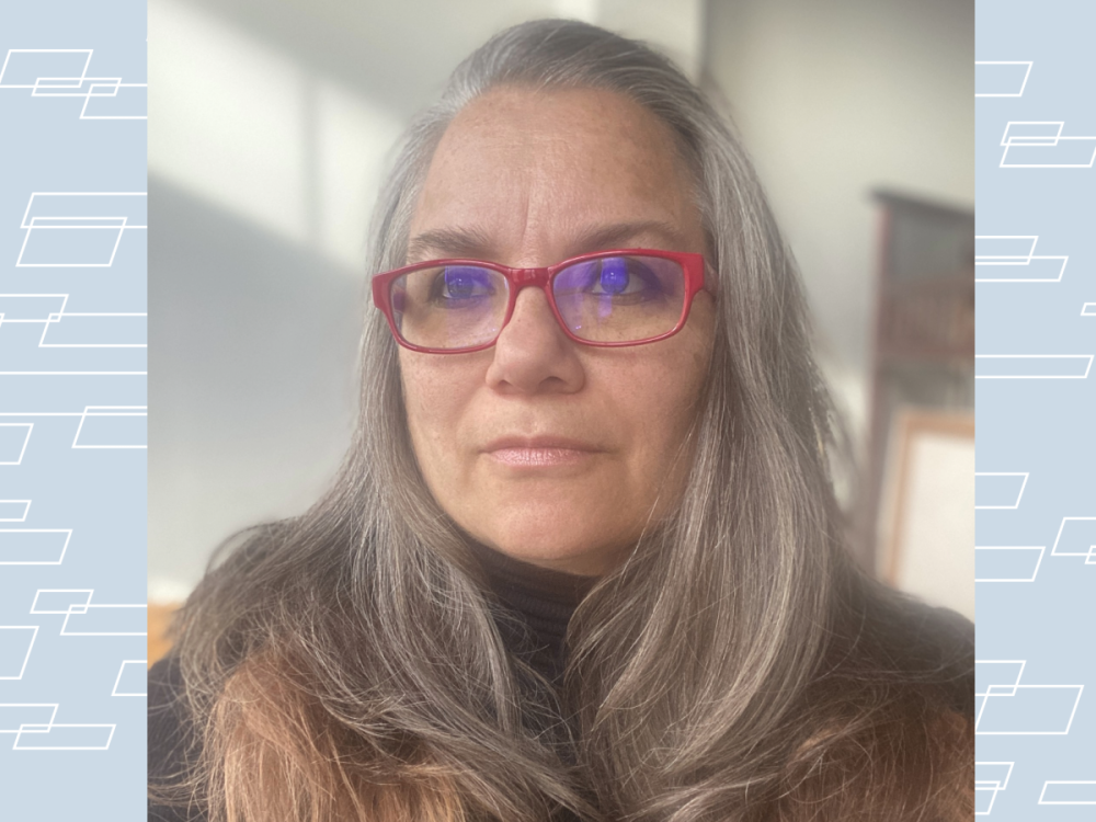photo portrait of woman with long hair and red eyeglasses