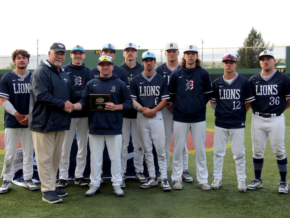 Members of the Penn State DuBois baseball team accept the runner up plaque for the 2025 PSUAC baseball season following the championship series at Showers Field in DuBois.