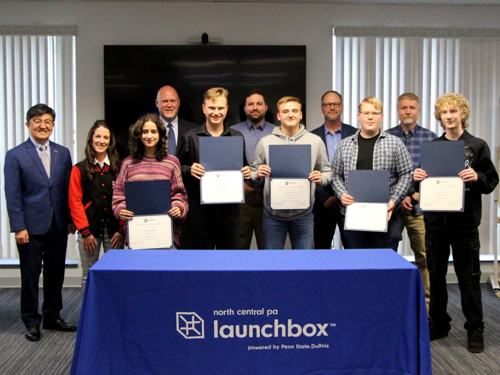 Students from the inaugural cohort of the Industry 4.0 Academy display their program certificates received during the certificate presentation ceremony held at Penn State DuBois. Students were joined by faculty and staff members from Penn State DuBois, the NCPA LaunchBox and the DuBois Area School District.