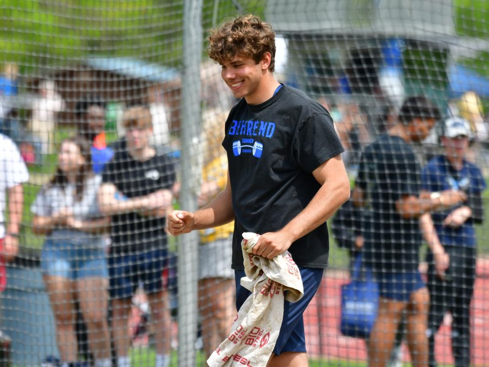 Track-and-field athlete Dan Dabrowski celebrates after a discus throw.