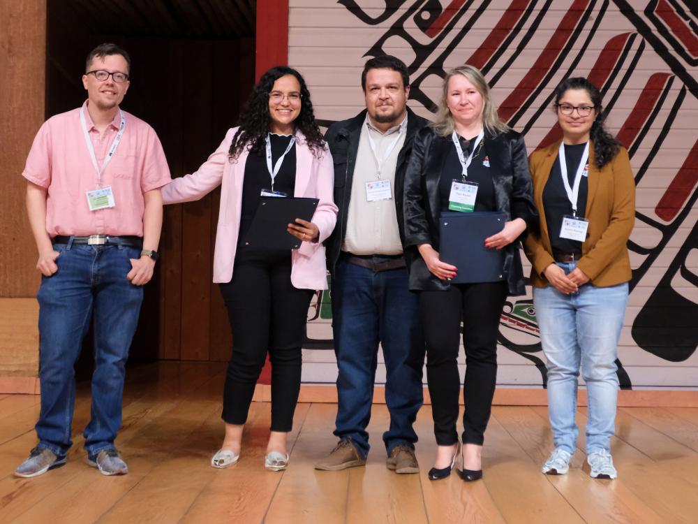 Five people receive awards for their research at an academic conference