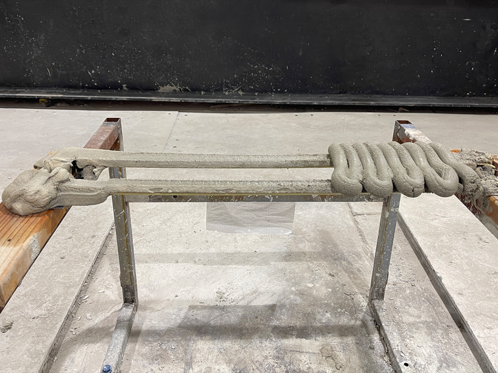 Freshly extruded 3D printed concrete.