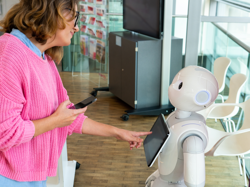 Person interacting with service robot
