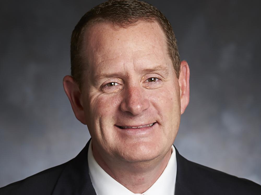 A head shot of Brian M. Begg
