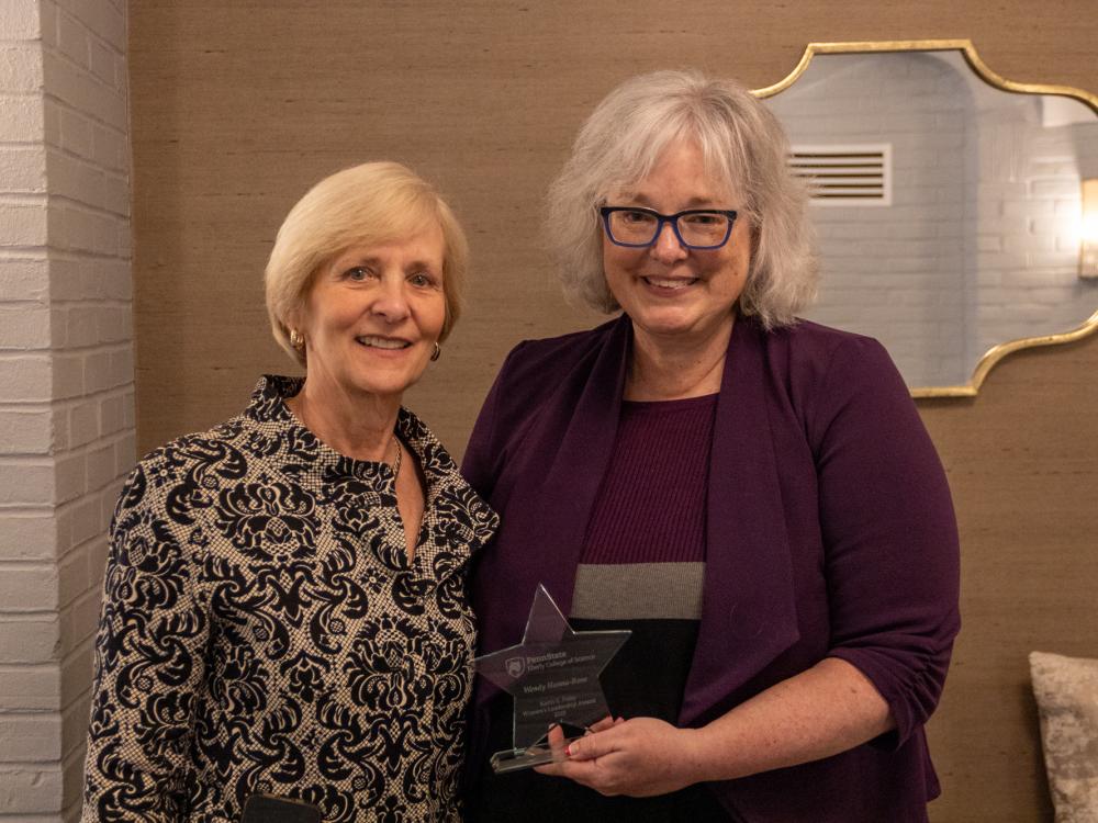 Karin Foley and Wendy Hanna-Rose posing with an award