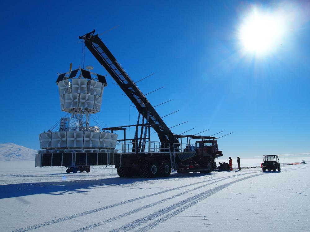 A detector mounted on a crane over ice