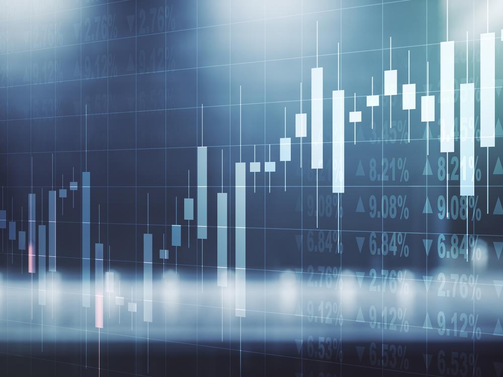 A digital rendering of a financial candlestick chart showing fluctuating stock or cryptocurrency prices on a blue-toned grid background.