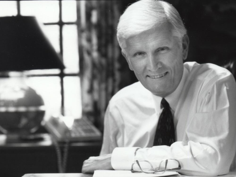 A black-and-white portrait of former Penn State Behrend Dean John M. Lilley