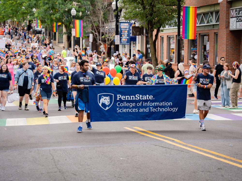 marchers in a downtown pride parade