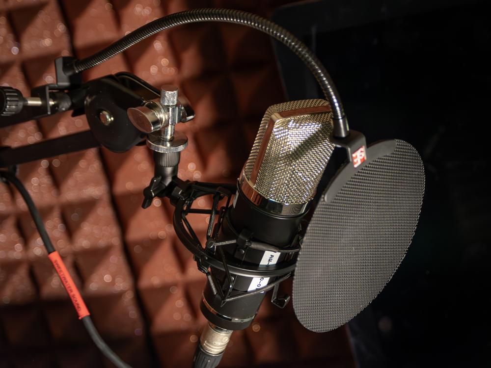 Closeup of a microphone in a podcast studio