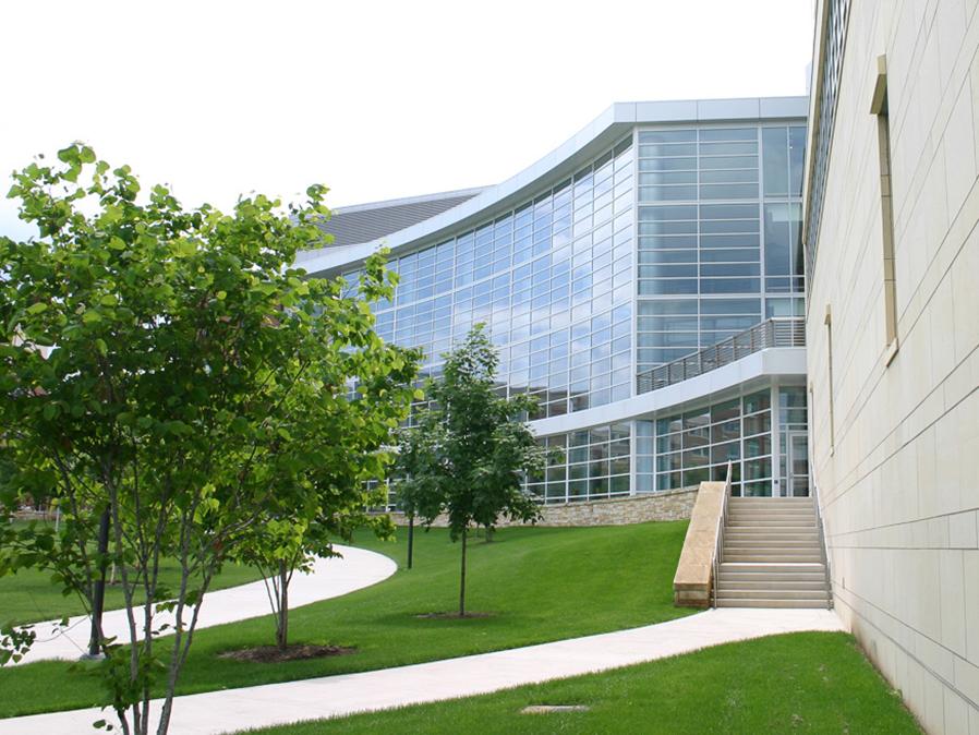 A photo of the Penn State Business Building in the summer from Park Avenue.
