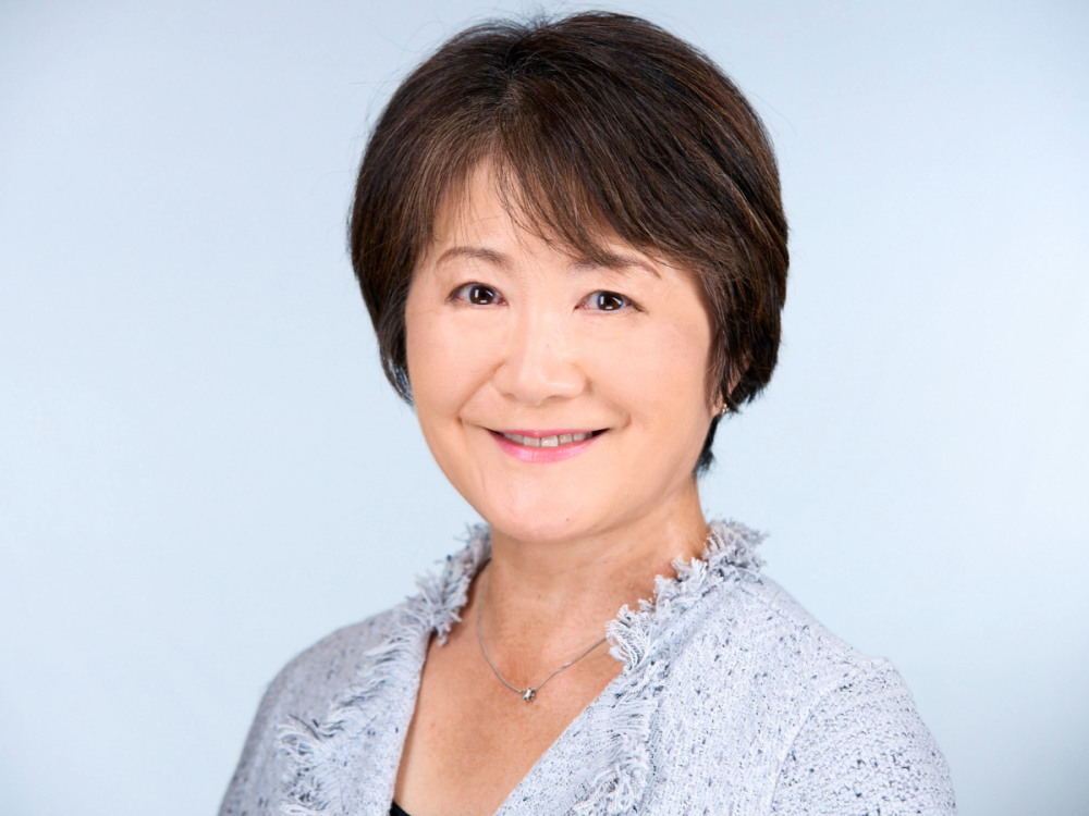 photo portrait of woman with short, straight black hair