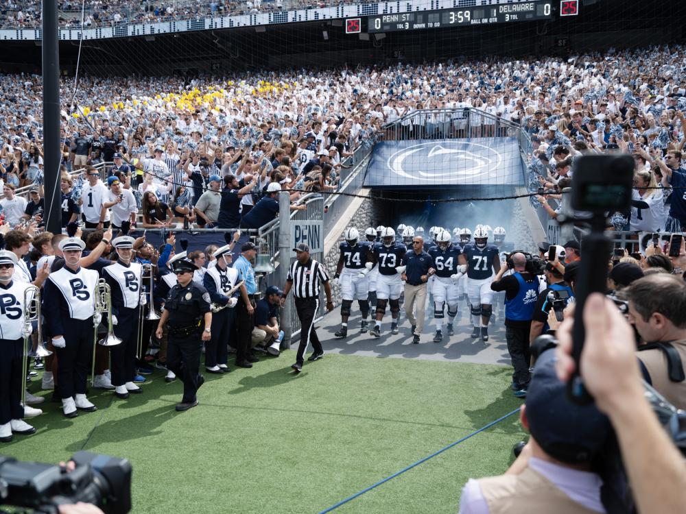Football Team walking onto the field