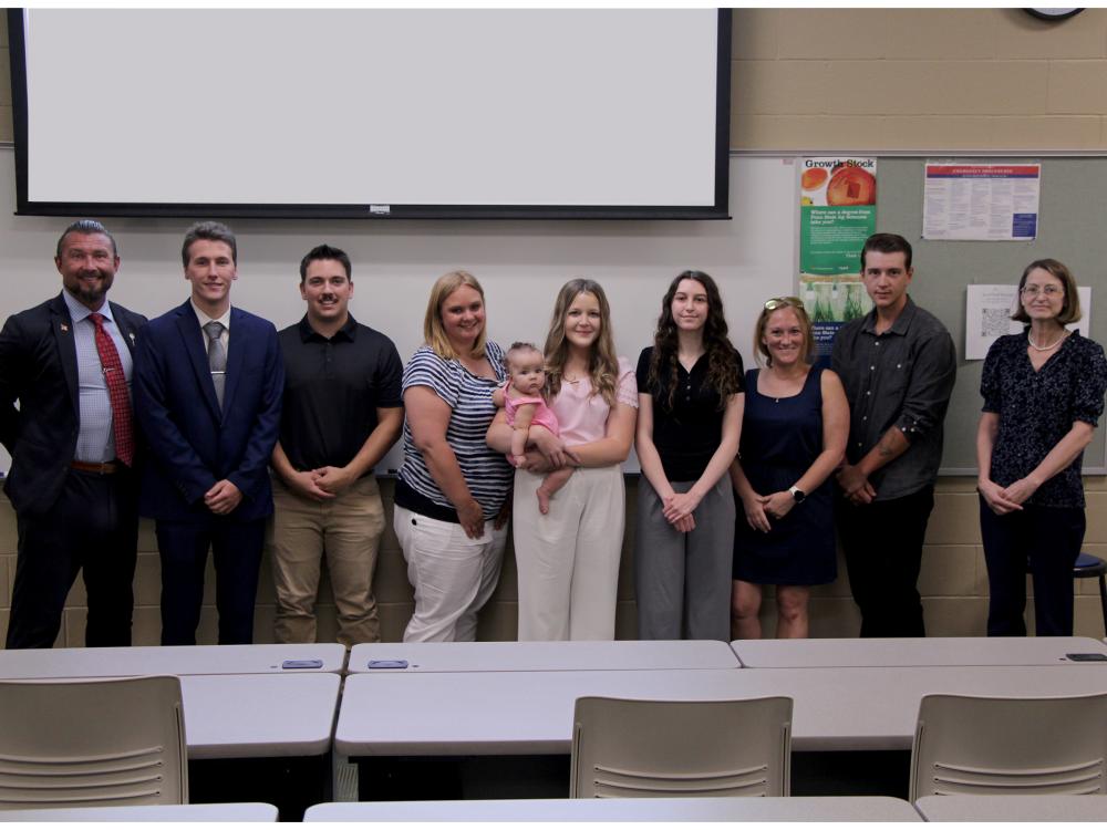 Five business students from Penn State DuBois stand for a group photo with their internship advisors during the internship presentation session held on campus on Aug. 15.