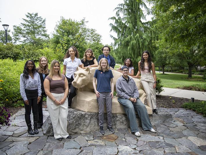 Biology Ahead students and their mentors by the Lion Shrine