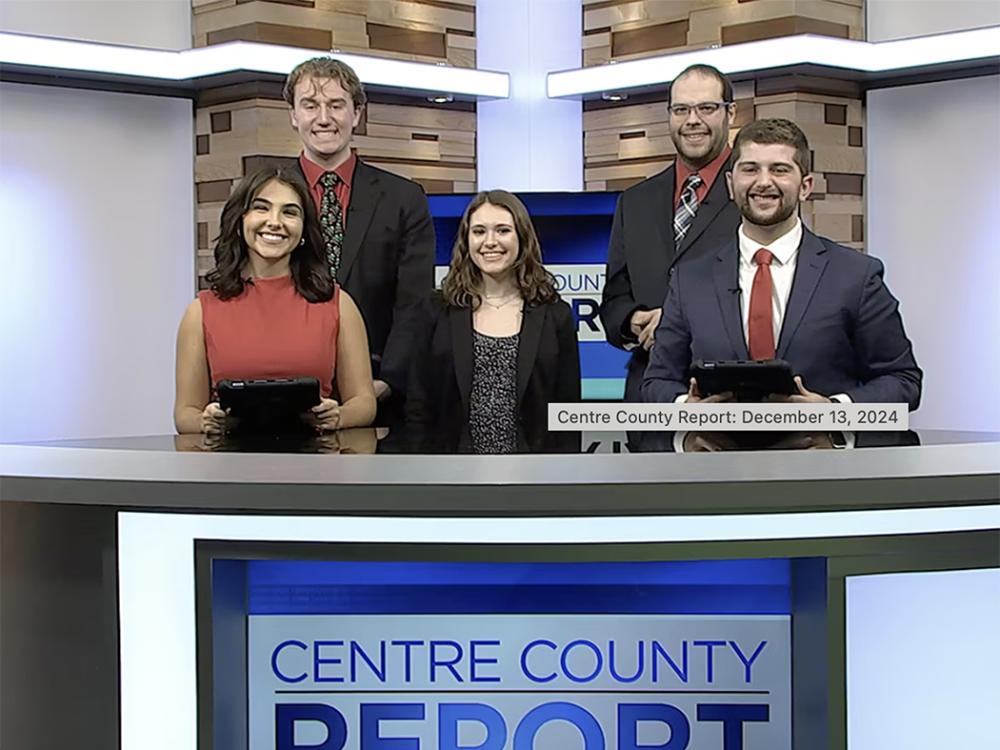 Students on a TV newscast set