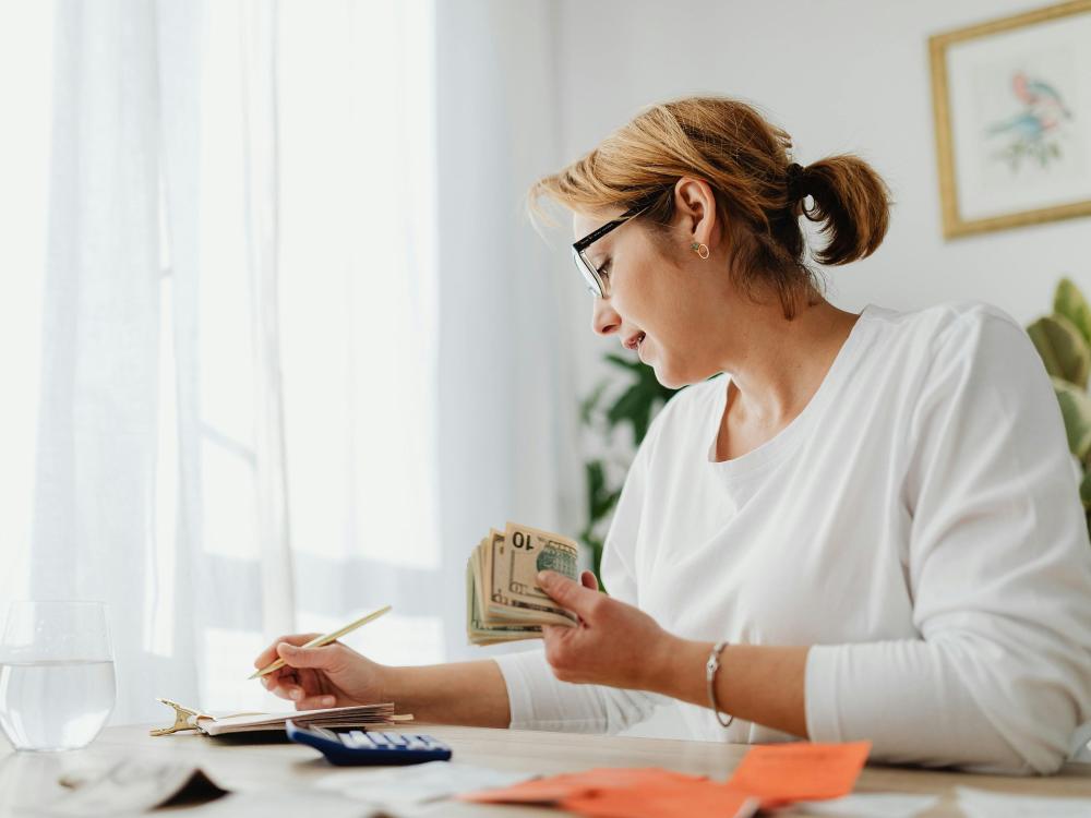 Woman Working on Home Finances at the Desk