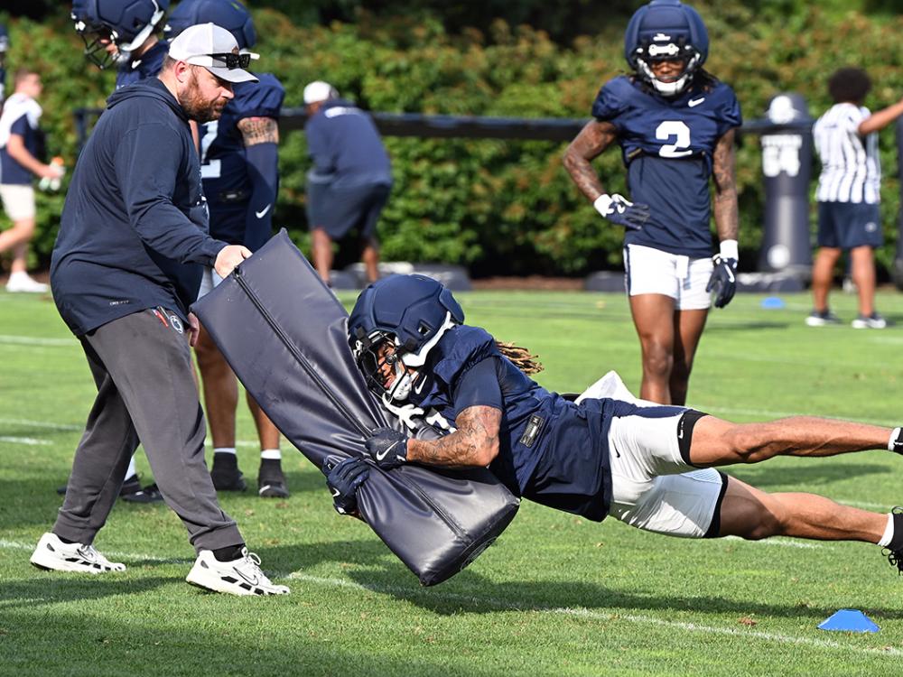 Player practices tackling