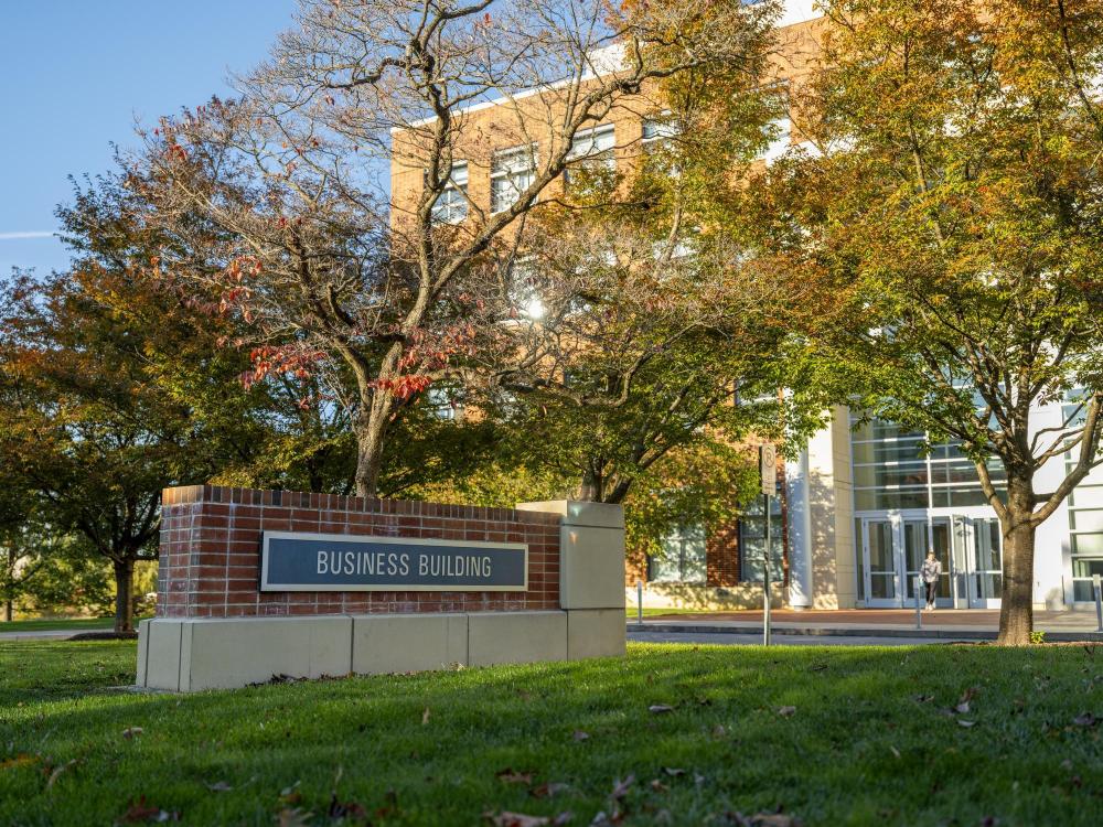 Penn State Smeal College of Business Building and sign in fall