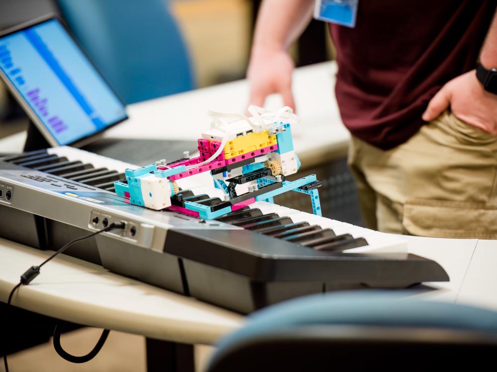 Robotics prototyping enabled a device to play a keyboard at the 2024 TLT Symposium.