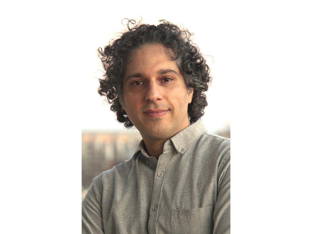 headshot of acclaimed writer ali araghi