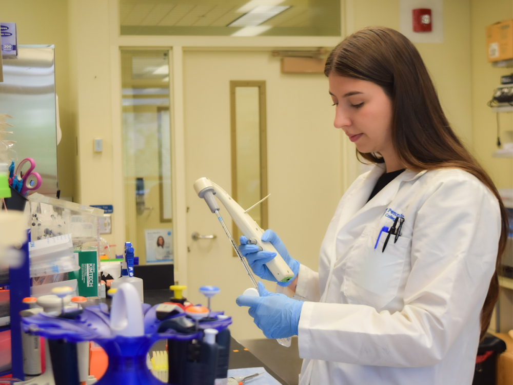 Research scientist preparing experiment in lab