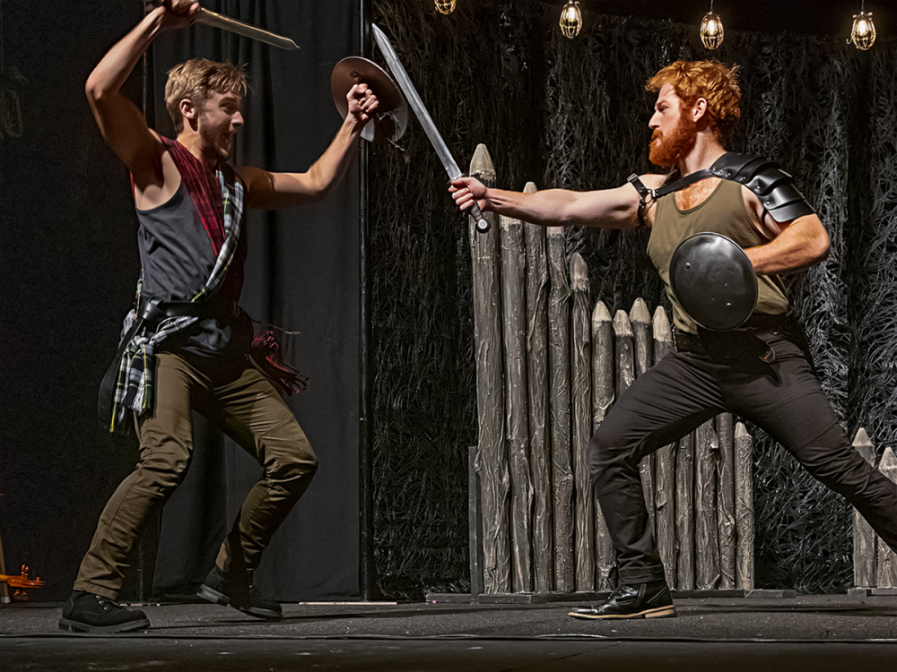 Two actors from the Linny Fowler WillPower Tour perform a sword fight scene from “Macbeth."