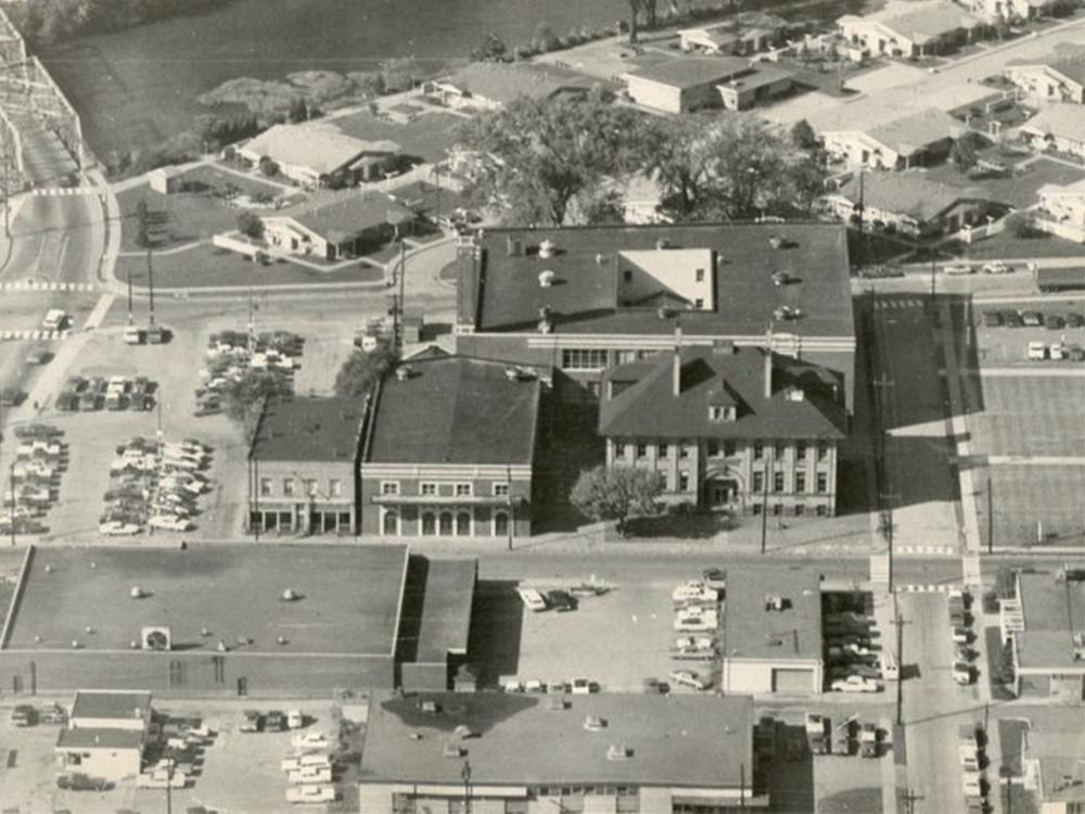 Historical black and white aerial photo of the buildings that now make up the Penn State Shenango campus.