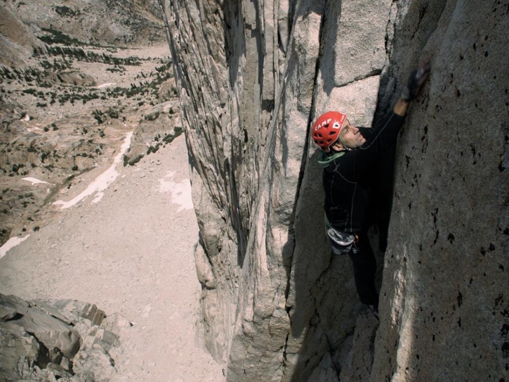 A man climbs a rock wall