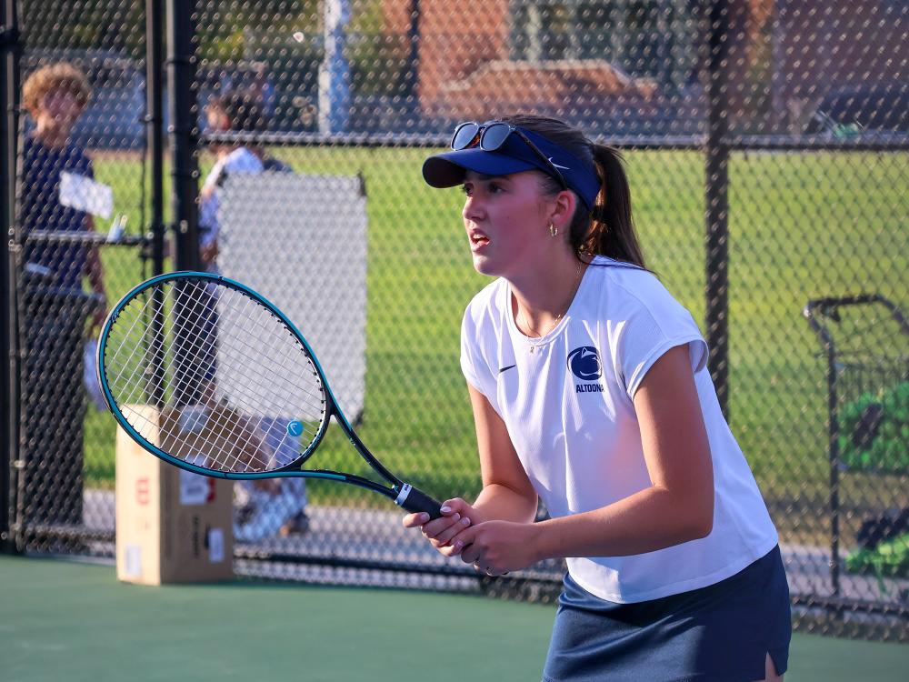 Rachel Stricek plays in a tennis match at Penn State Altoona