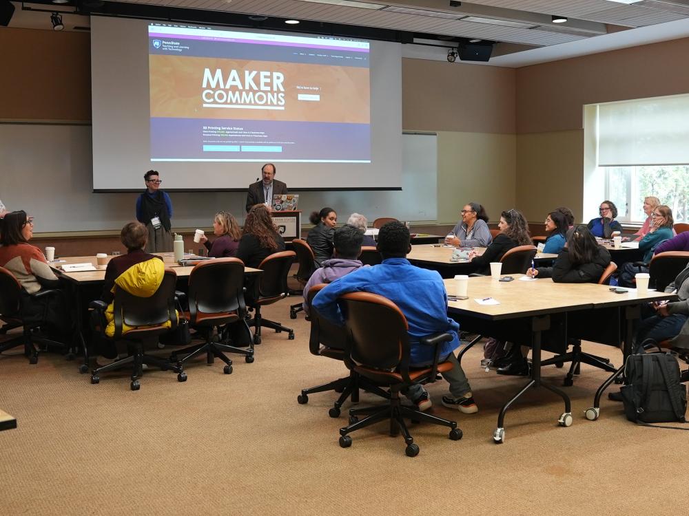Symposium attendees listen to a presentation about the Maker Commons at the Penn Stater Hotel and Conference Center. 