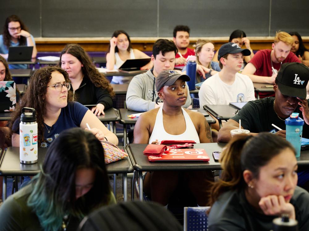 Students sitting at desks in classroom